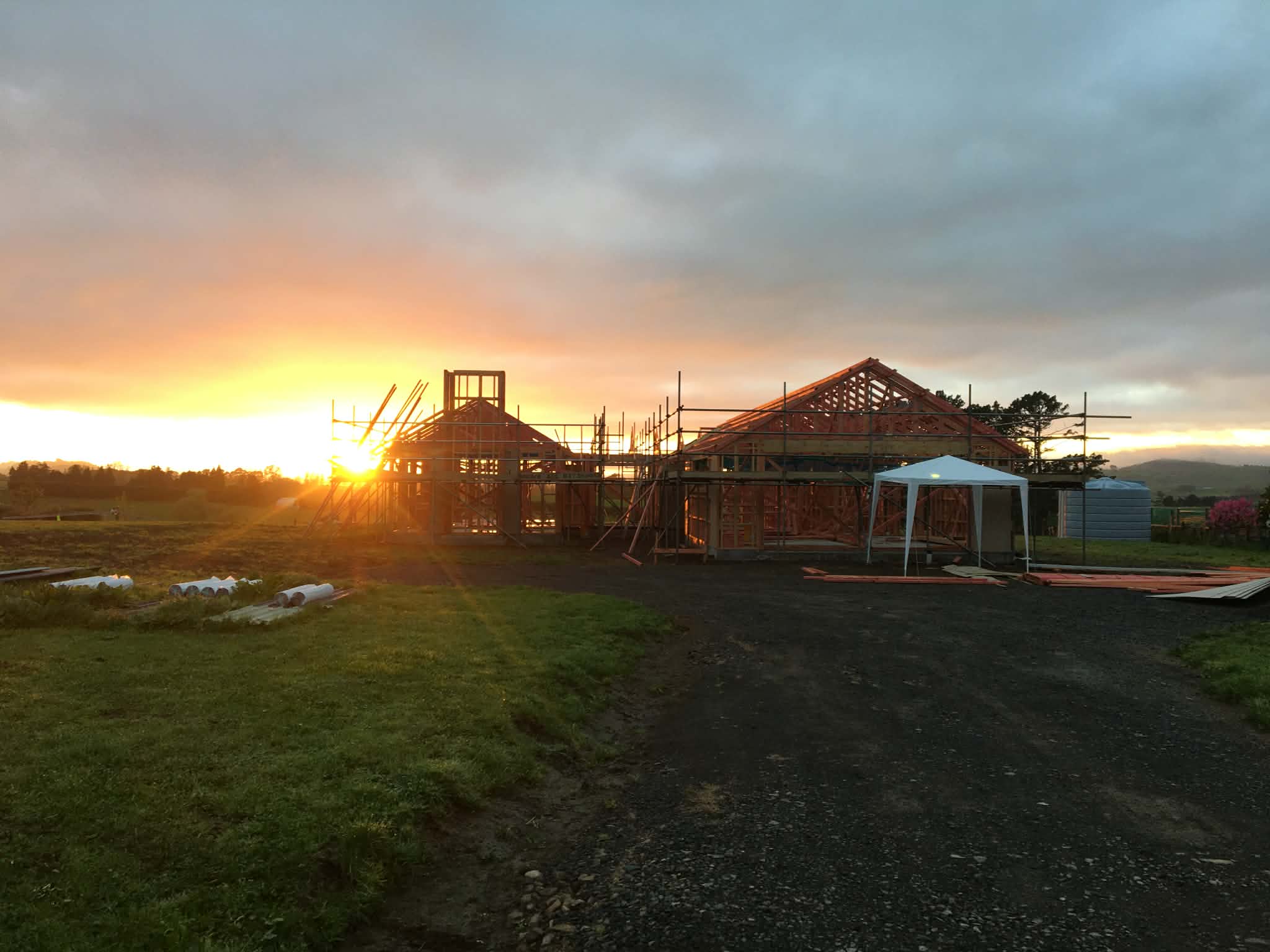 House frame silhouette at sunset